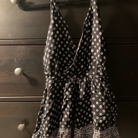 Olivaceous Black and White Halter Floral Patterned Romper - Picture 3 of 9